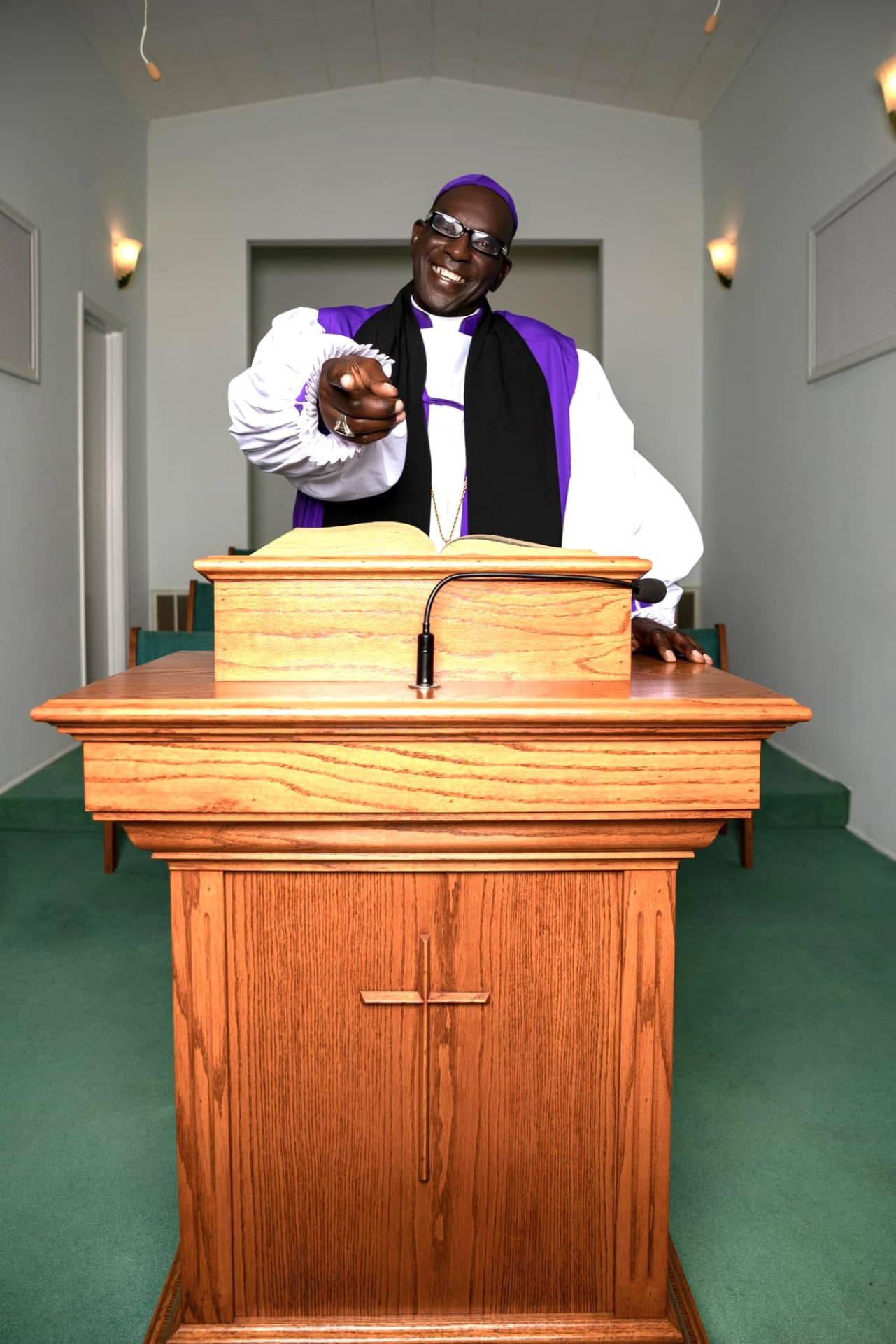 Bishop Duffie Johnson Sr. preaching from the pulpit