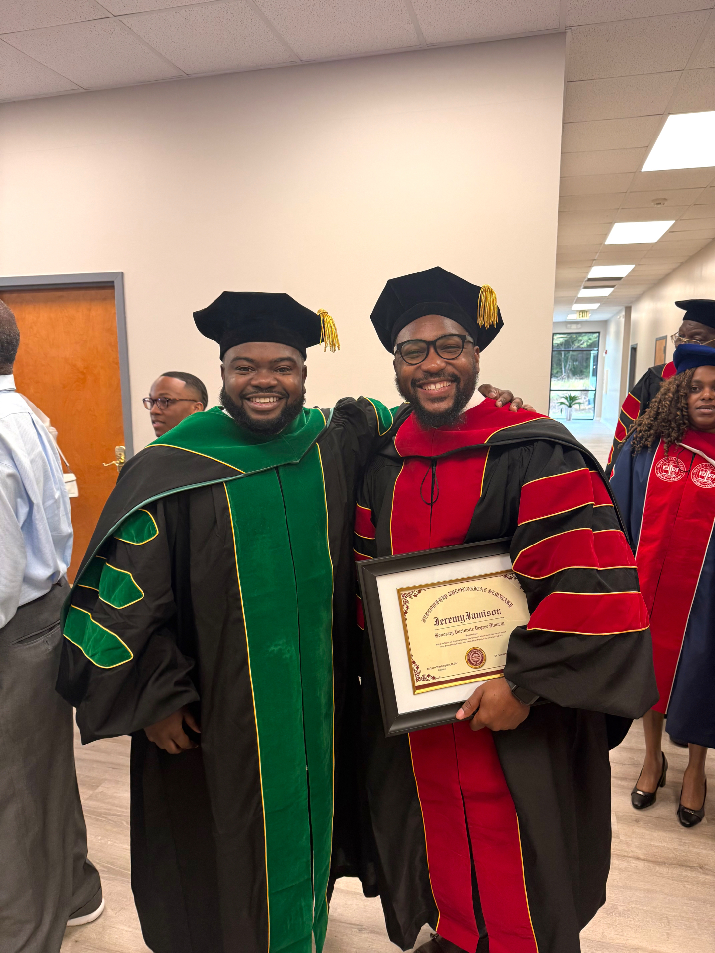 Dr. Jeremy Jamison receiving his Honorary Doctorate Degree in Divinity