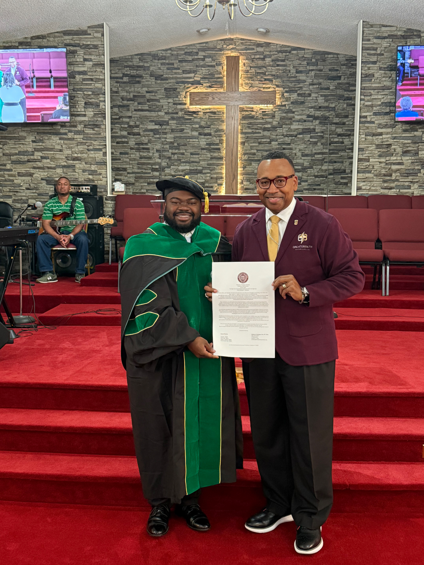 Seminary representative presenting an official Fellowship Theological Seminary letter to a pastor